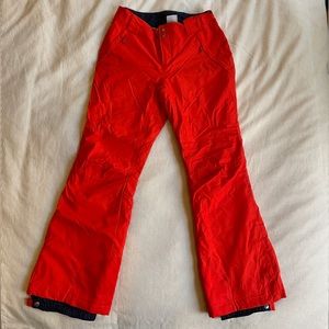 Bright orange-red ski pants